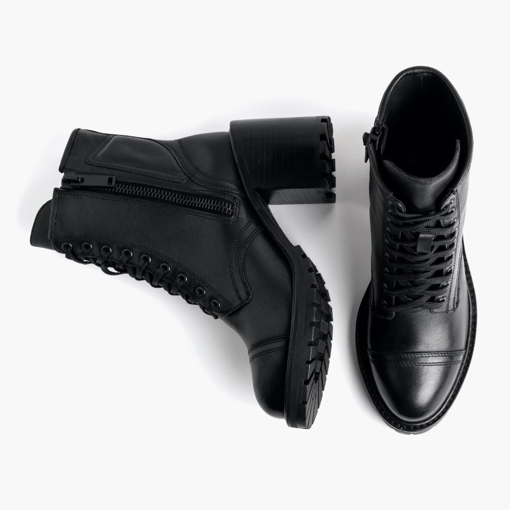 High-Traction Rubber Outsole & Lug Tread Pattern on Rebel Schwarz Lederstiefel für Damen