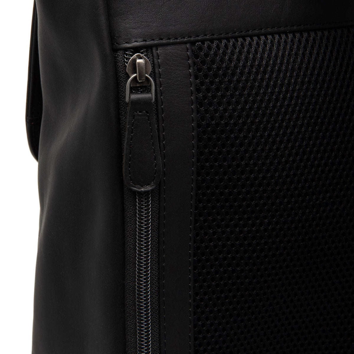 Solid Antique Brass Hardware & Heavy-Duty Dual Zipper Detail on Farrow Full-Grain Leather Laptop Backpack