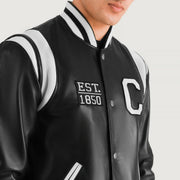 
Detailansicht of Varsity & Snap Button Hardware on Liberte California Schwarz Leather Varsity Lederjacke für Herren
